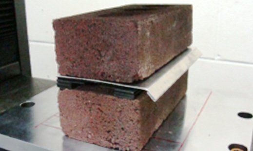 WickRight Vented Drip Edge for parapets with capstones crush test shows it can hold over 300 lbs per square inch
