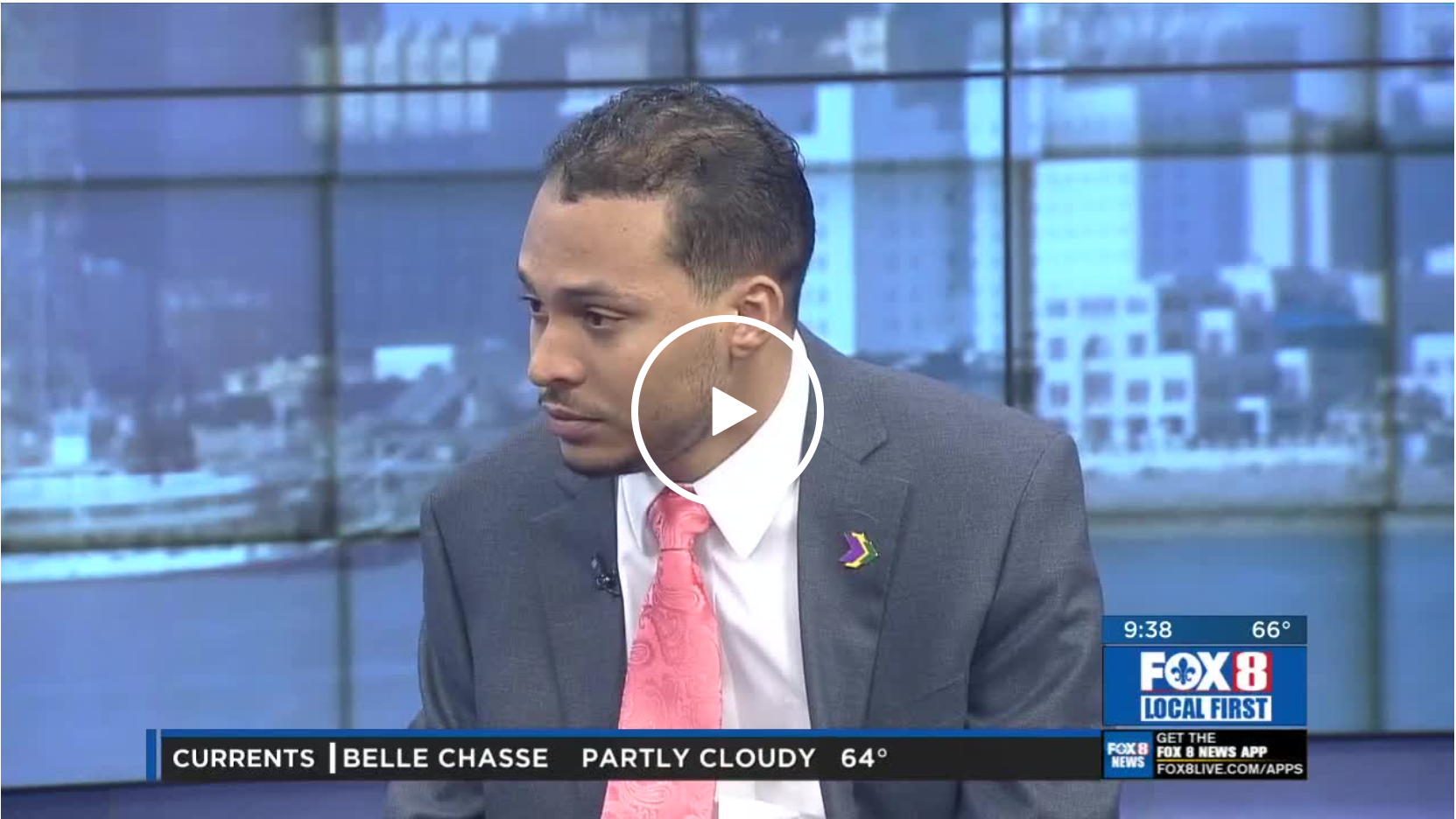 A man in a suit and tie is on fox 8 news