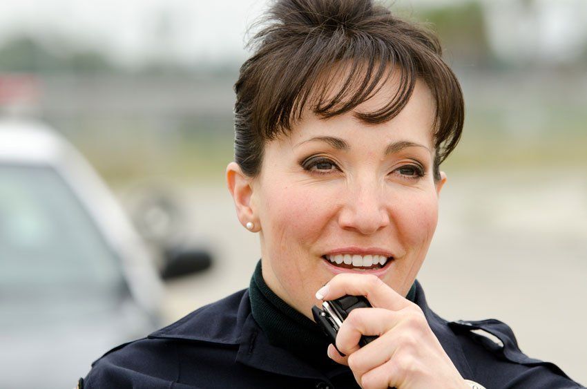 smiling police officer smiling police officer
