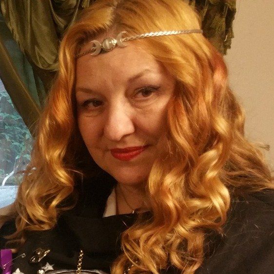 Bella is the Archpriestess of the Aquarian Tabernacle Church, Intl.