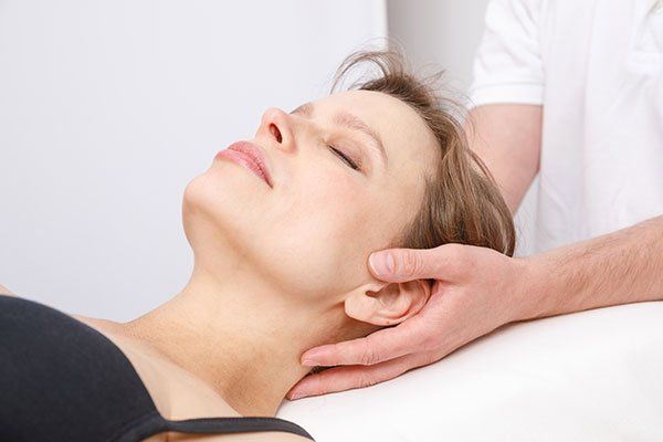 Woman Receiving Osteopathic Treatment — Springfield, MO — James River Chiropractic & Wellness