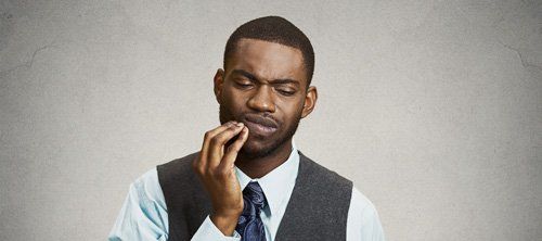 Black man having dental pain