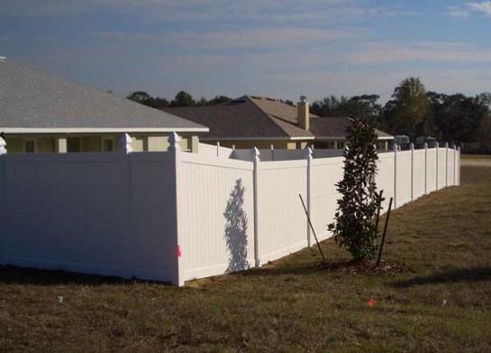 Residential privacy vinyl fence installation - outside view