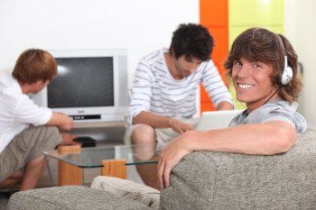 Students grouped around a sofa