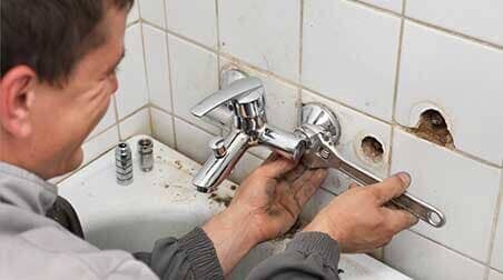 Plumber at Work — Plumbing and Piping Fixed and Installed in Fort Walton Beach,FL Plumber at Work — Plumbing and Piping Fixed and Installed in Fort Walton Beach,FL