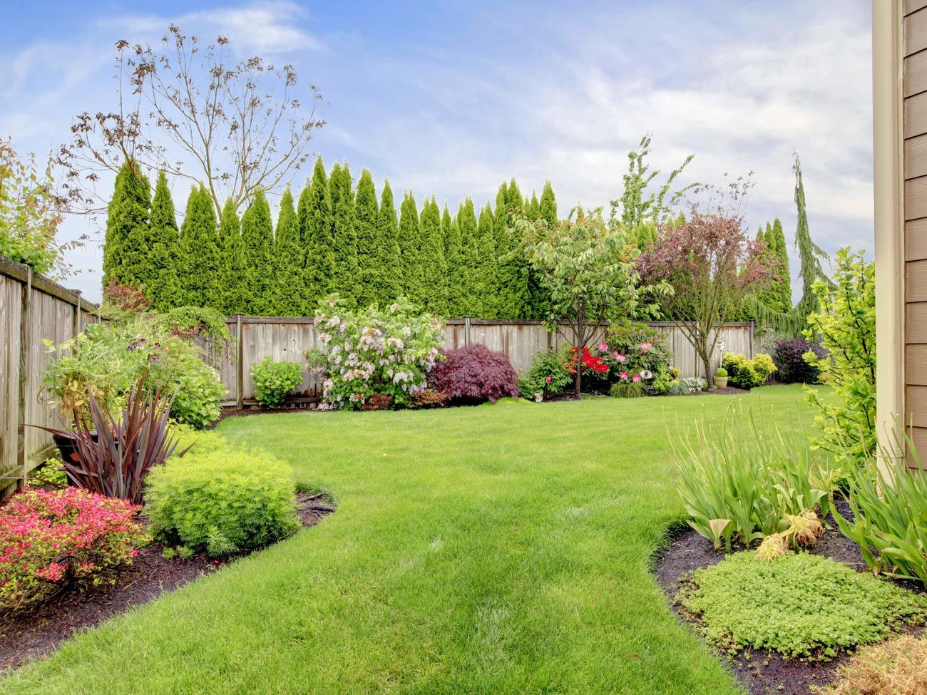 Landscape With Flowers And Trees — Decatur, TX — Superior Lawn & Landscape