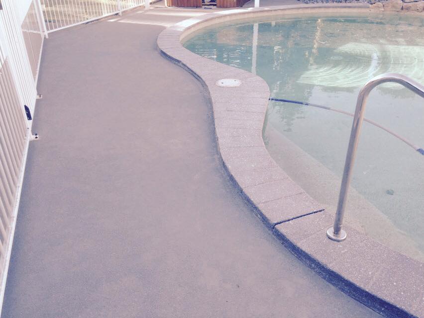 Concrete Floor At Pool Surroundings — Masonry Construction in Sunshine Coast, QLD