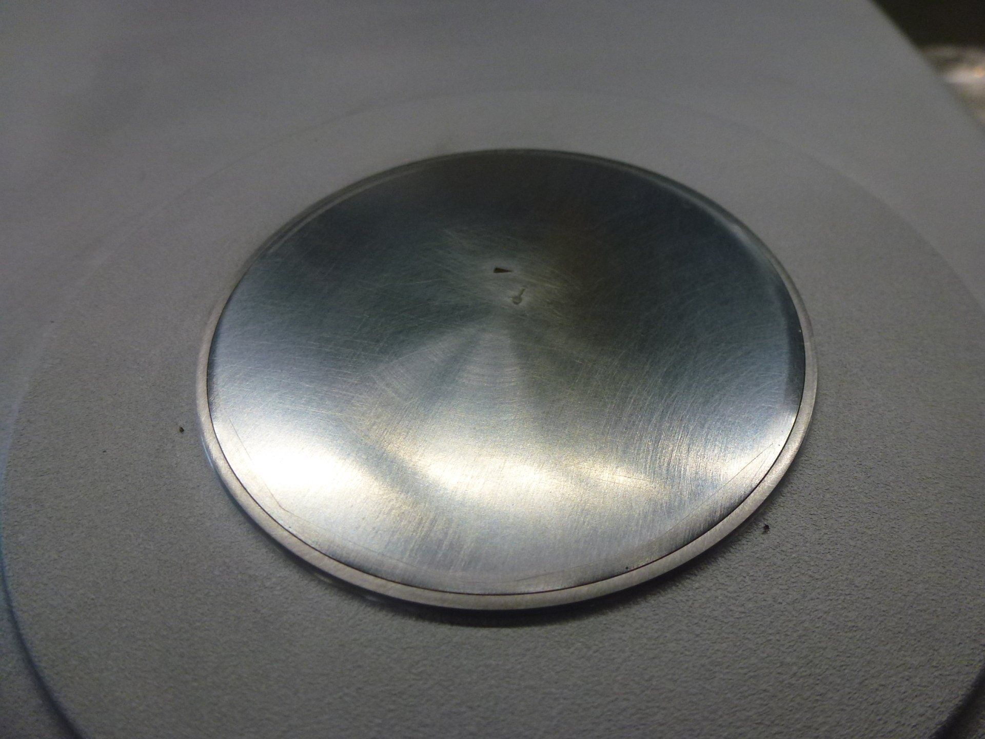 A close up of a metal object on a table