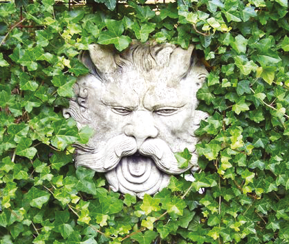 sungod plaque stone garden statue