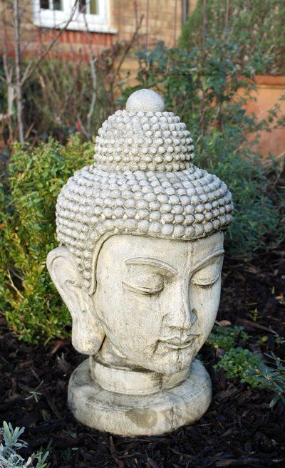 buddha head stone garden statue