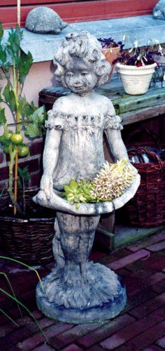 stone garden statue alice