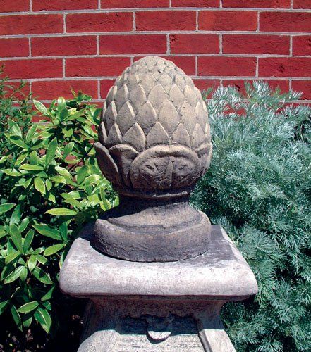 stone garden statue fir cone
