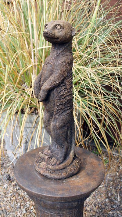 stone garden statue meerkat