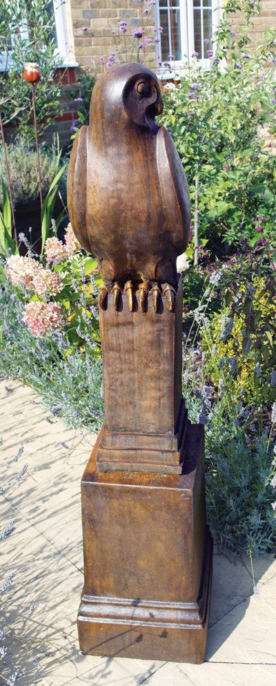 stone garden statue owl