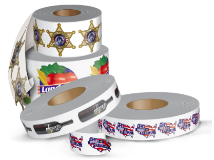 Decorative rolls of patterned adhesive tape with sheriff stars, fruit, and racing logos