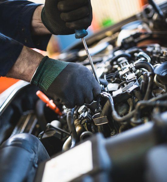 Fixing a Car Engine — Holly Hill, FL — Whitt Automotive for Auto Repair Services Fixing a Car Engine — Holly Hill, FL — Whitt Automotive for Auto Repair Services
