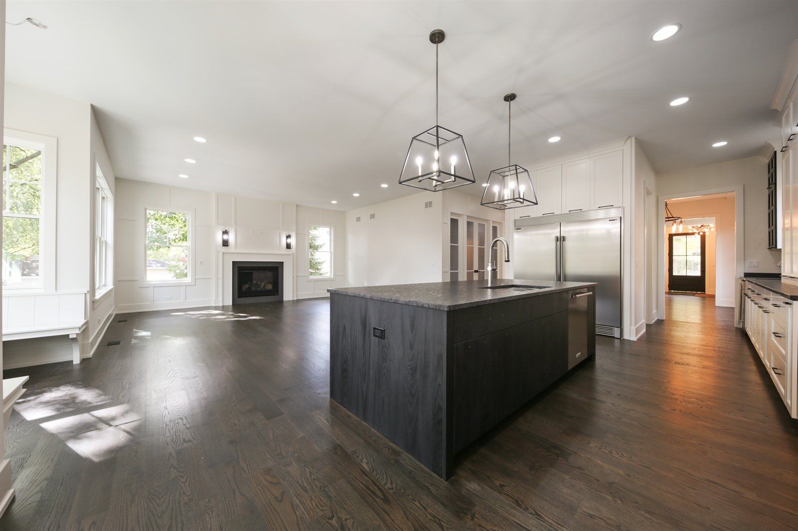 There is a large island in the middle of the kitchen.