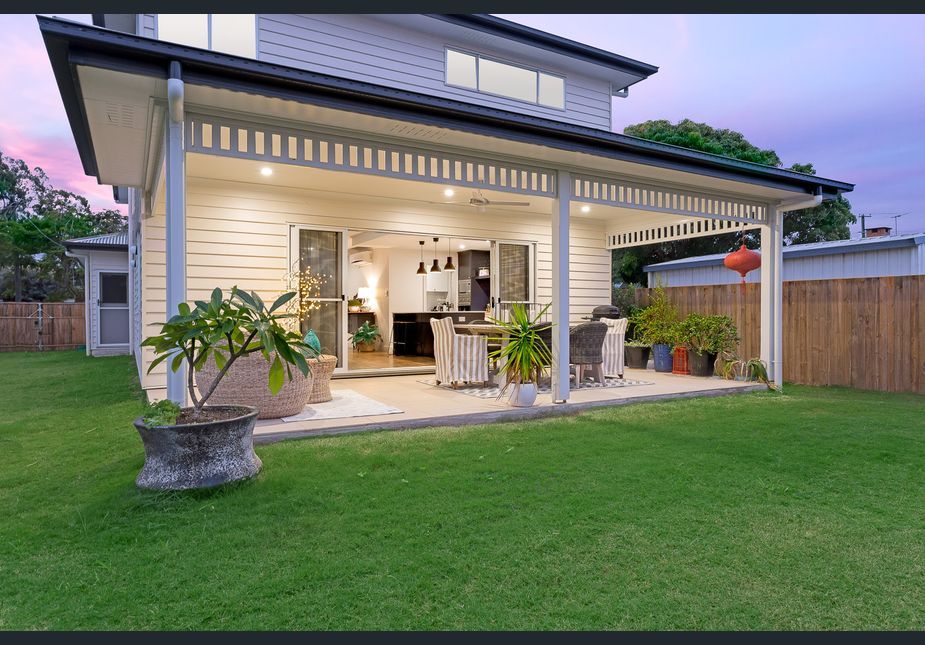 home with patio and grass yard
