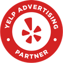 A yelp advertising partner logo in a red circle