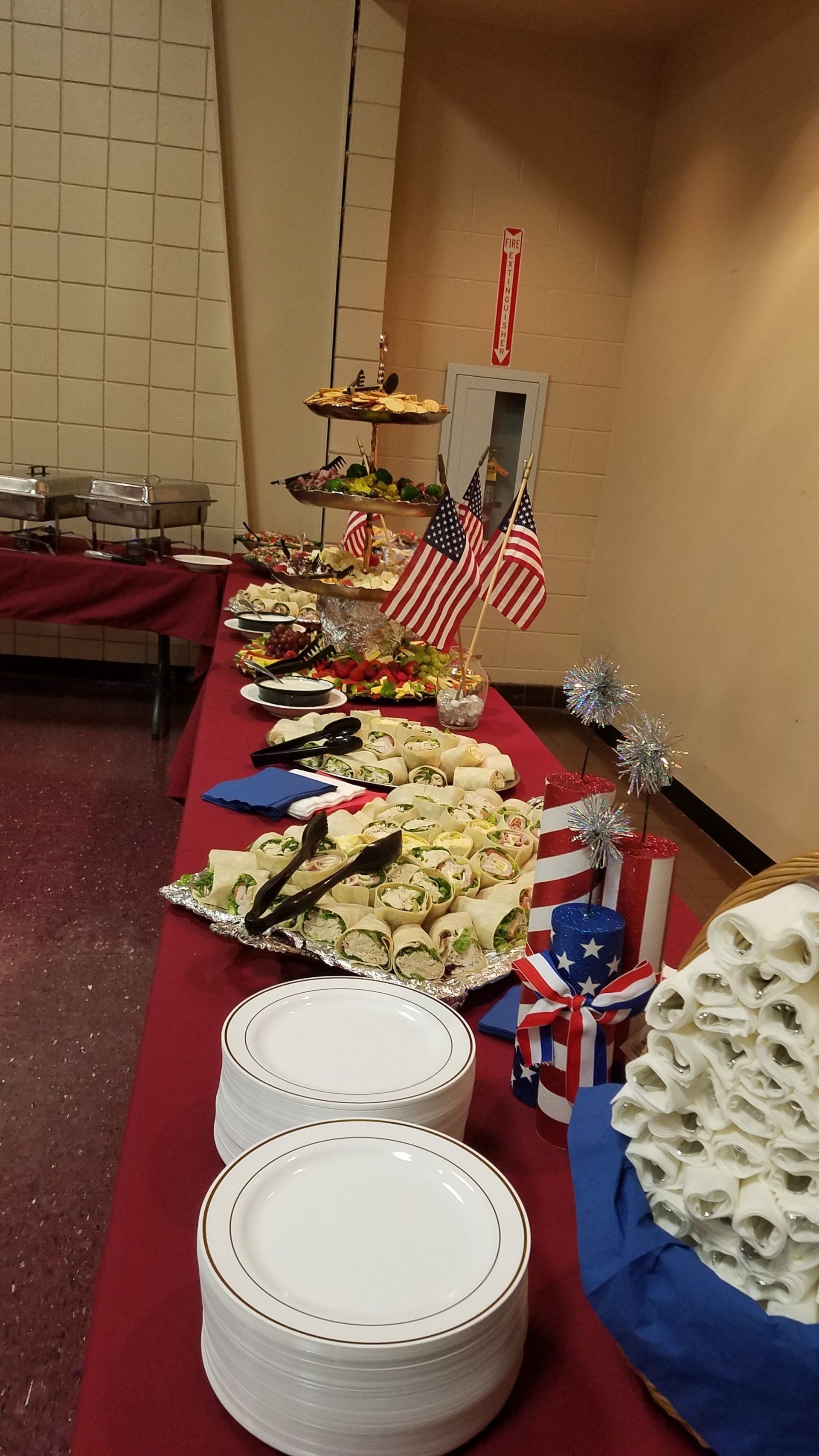 There is a buffet table with a lot of food on it.