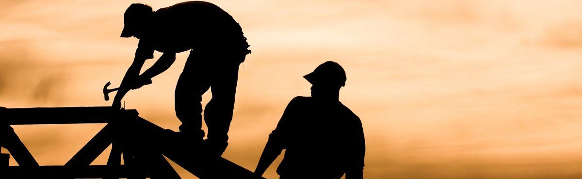 high quality roofing restoration man working on roof