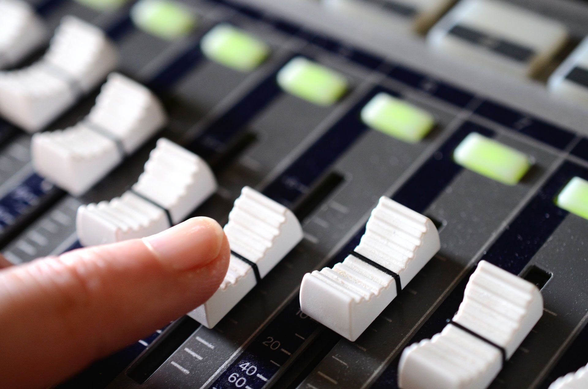 a person 's finger is pressing a button that says 20 on it