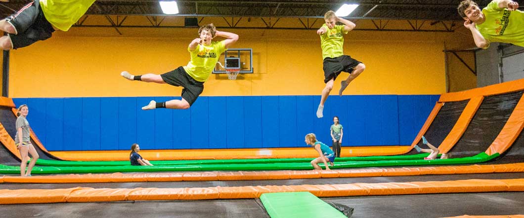 Teenagers having fun jumping on the trampoline
