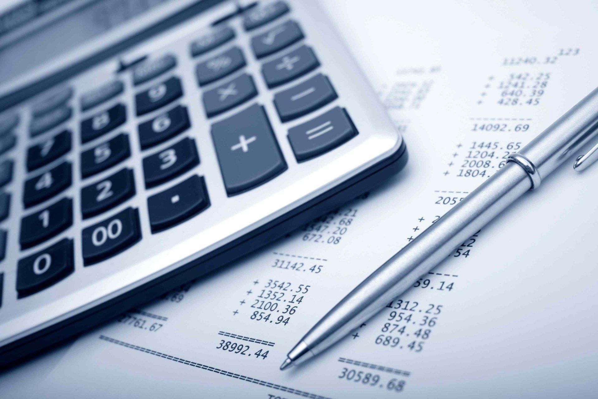 Photo of Calculator, pen, and receipt