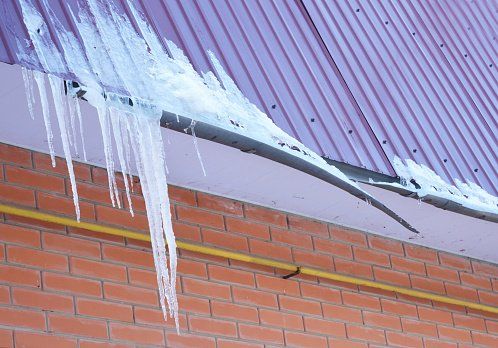 Affordable Gutter Repair — Broken Rain Gutters Ice Dam in White House, TN Affordable Gutter Repair — Broken Rain Gutters Ice Dam in White House, TN