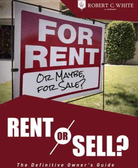 A red sign that says for rent on it