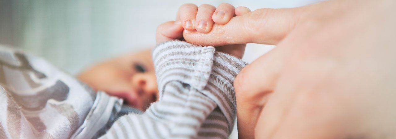 baby holding hand