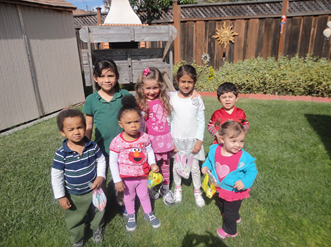 children having an Easter egg hunt