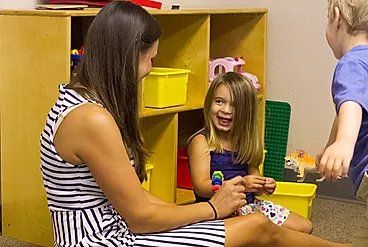 A Teacher and a Very Happy Child — Overland Park, KS — Premier Learning A Teacher and a Very Happy Child — Overland Park, KS — Premier Learning