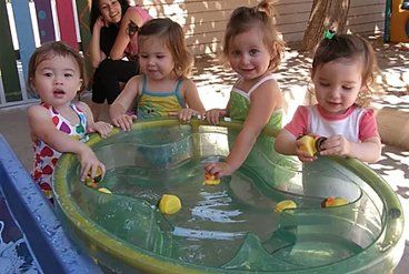 Beautiful Kids Playing Water — Overland Park, KS — Premier Learning Beautiful Kids Playing Water — Overland Park, KS — Premier Learning