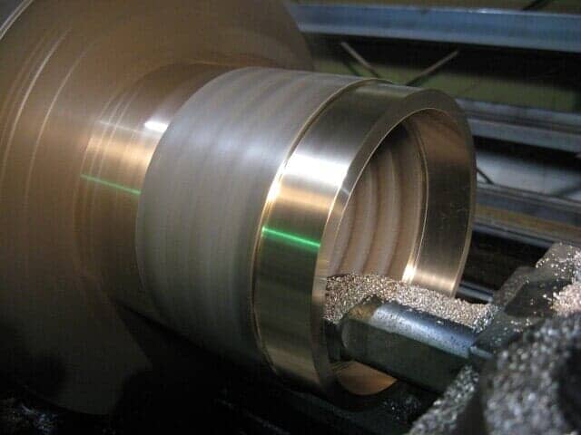 Lathe turning bronze wear ring—Welding in Richmond,VA I-95