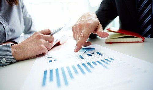 Accounting professional discussing the financial report 
