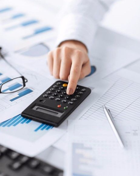 Accountant cross checking the account balance sheets 