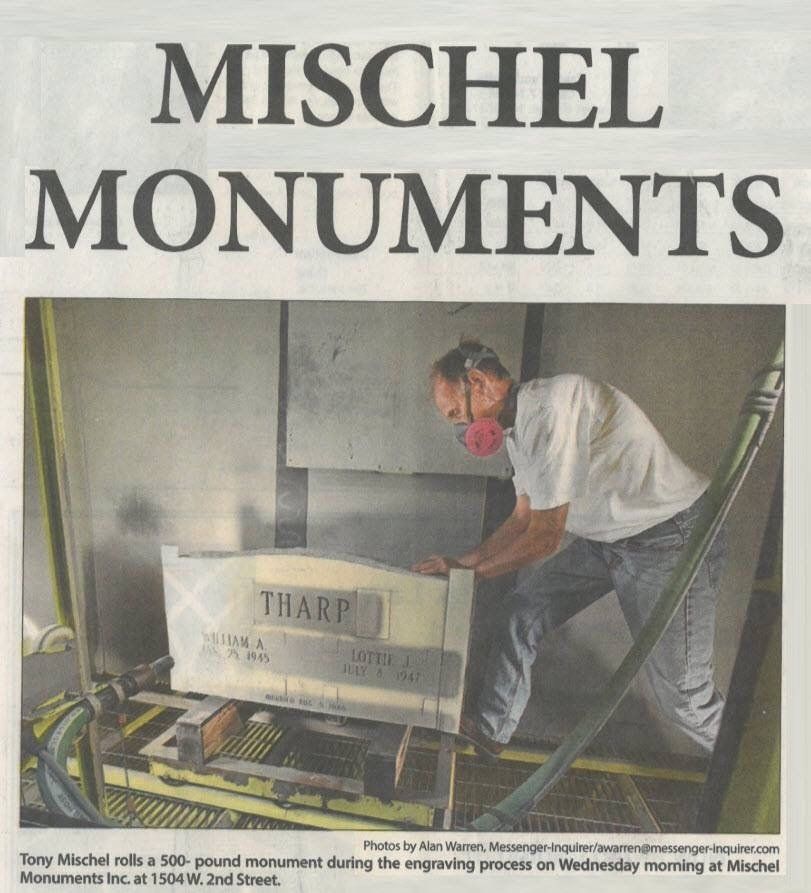 A newspaper article about mischel monuments with a picture of a man