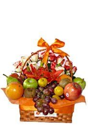 TATY FLORISTERIA - Canasto de flores y frutas