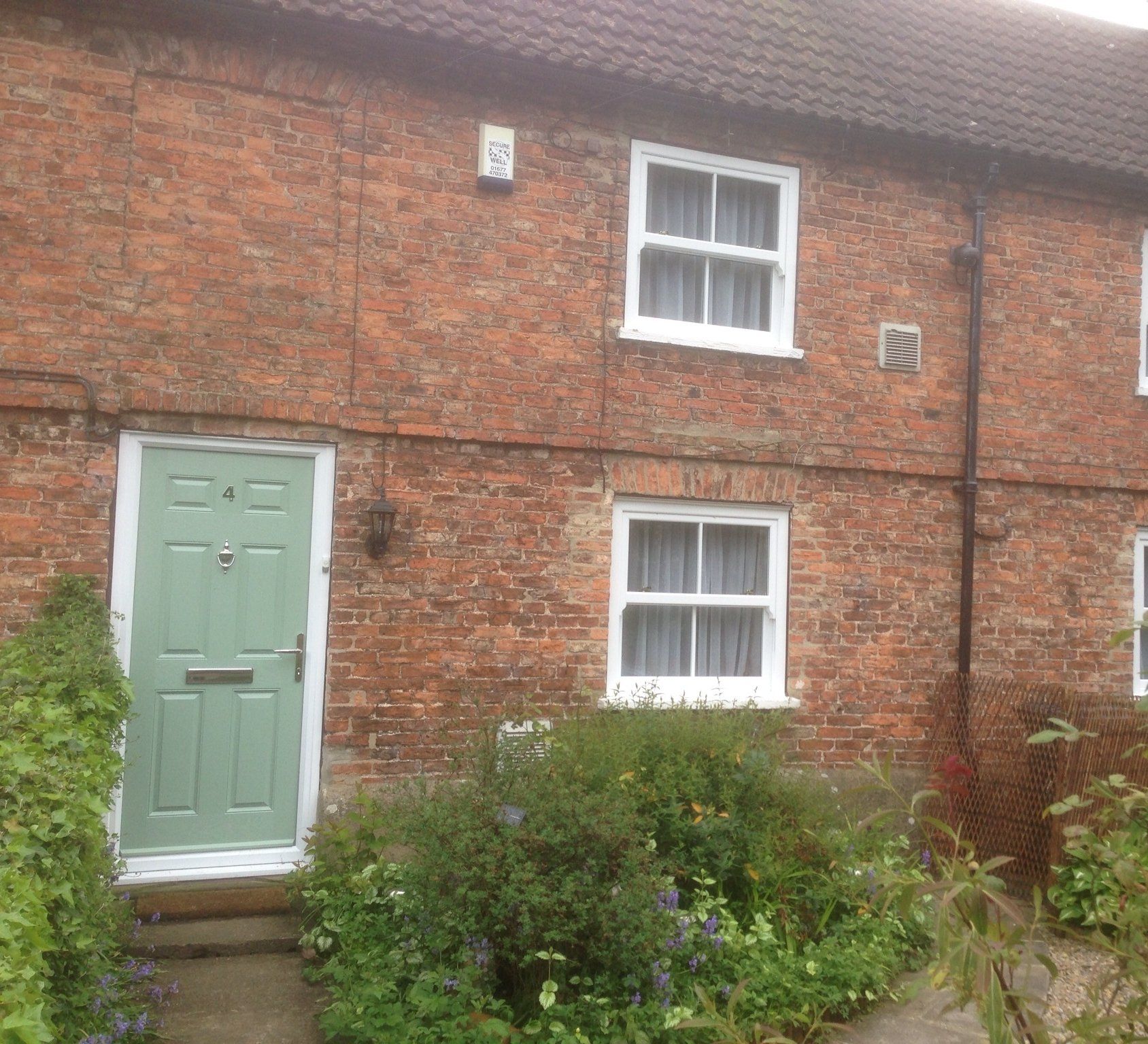 exterior view of a house with composite doors