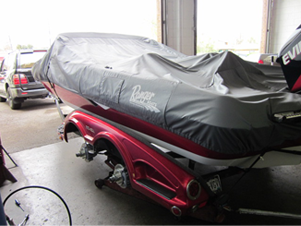 Speed boat on trailer