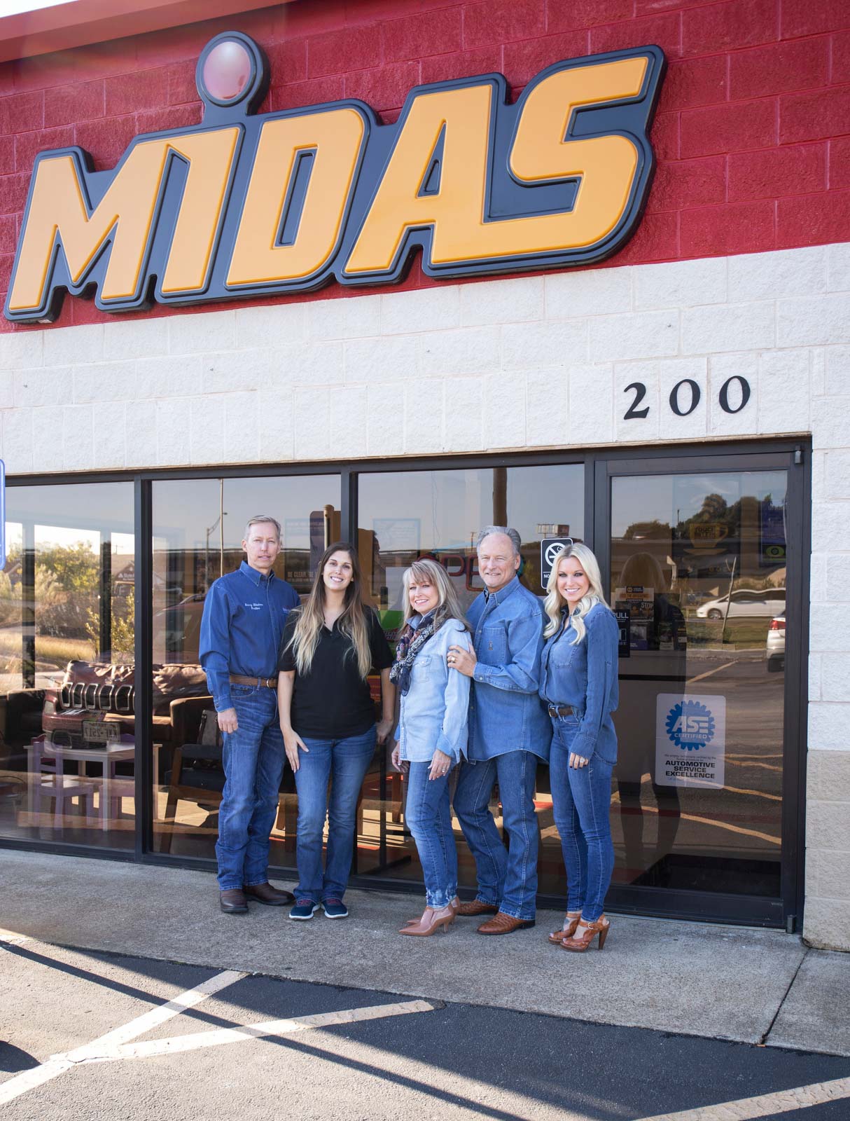 John Reider Properties Team Photo with Midas Property