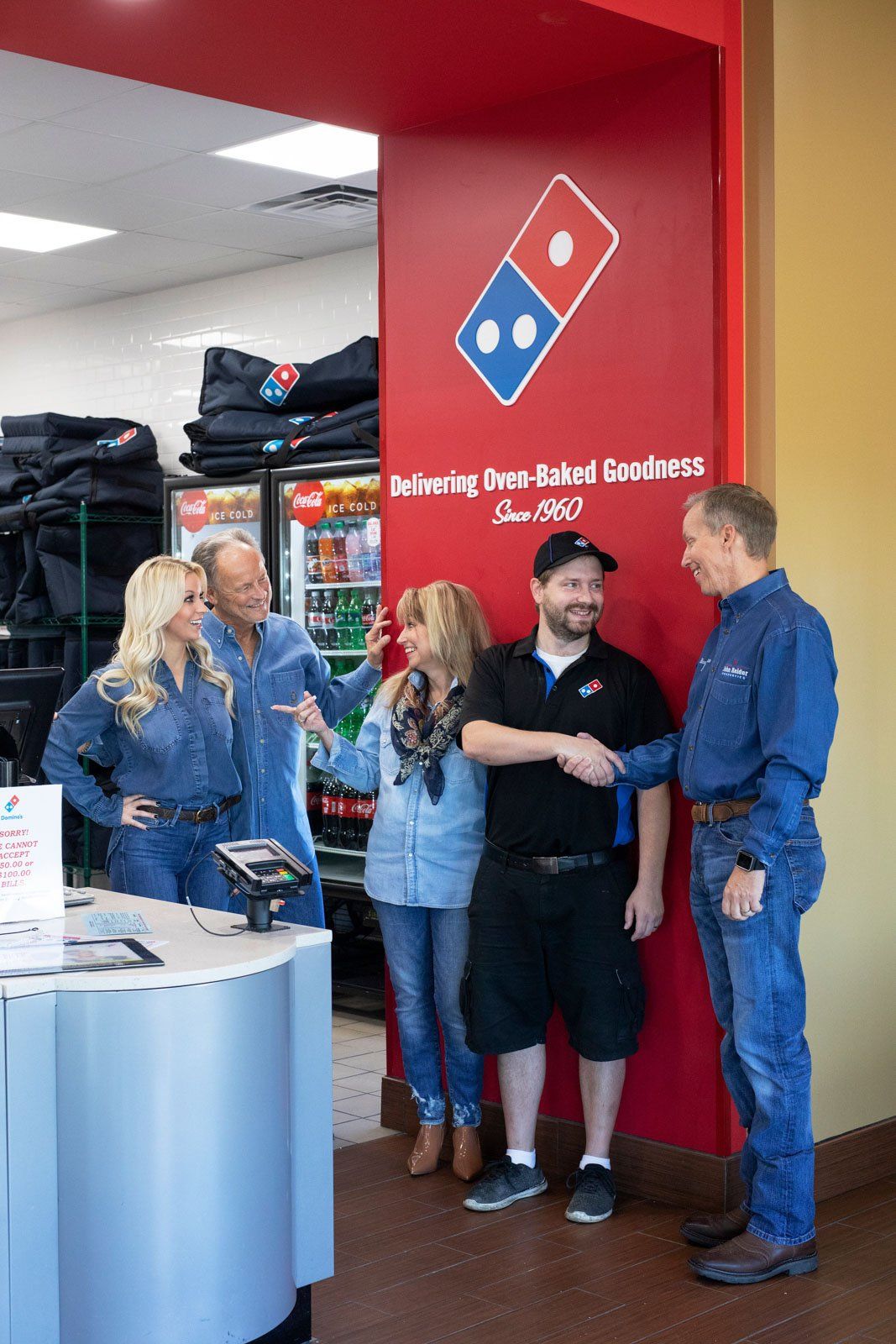 John Reider Properties Team Photo with Dominos Property