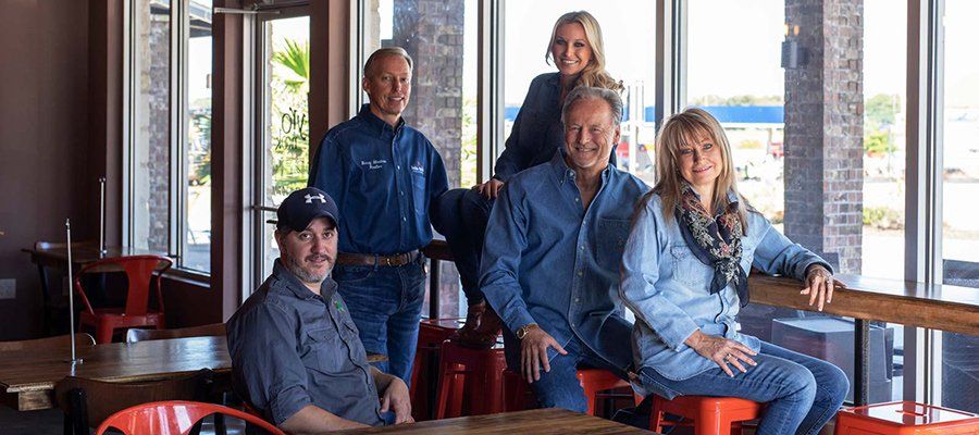 John Reider Properties Photo of team with tenant