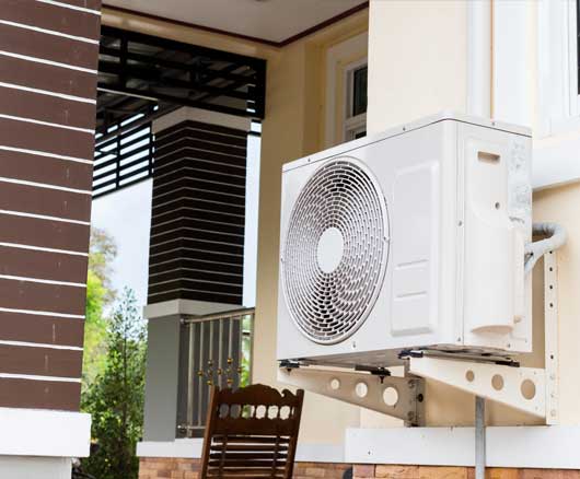 Air Conditioning Fixed to a Wall — Zachary, LA — Hughes Mechanical Contractors Air Conditioning Fixed to a Wall — Zachary, LA — Hughes Mechanical Contractors