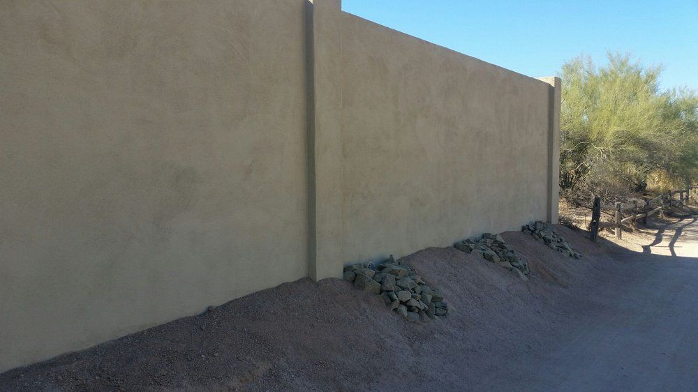 Cement Wall with Sand and Stone — Phoenix, AZ — Building Block Masonry