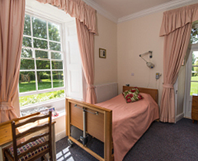 a stunning, well-furnished bedroom for elderly people