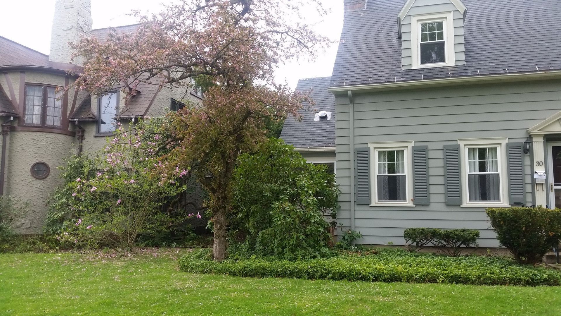 front left of gray house without landscaping