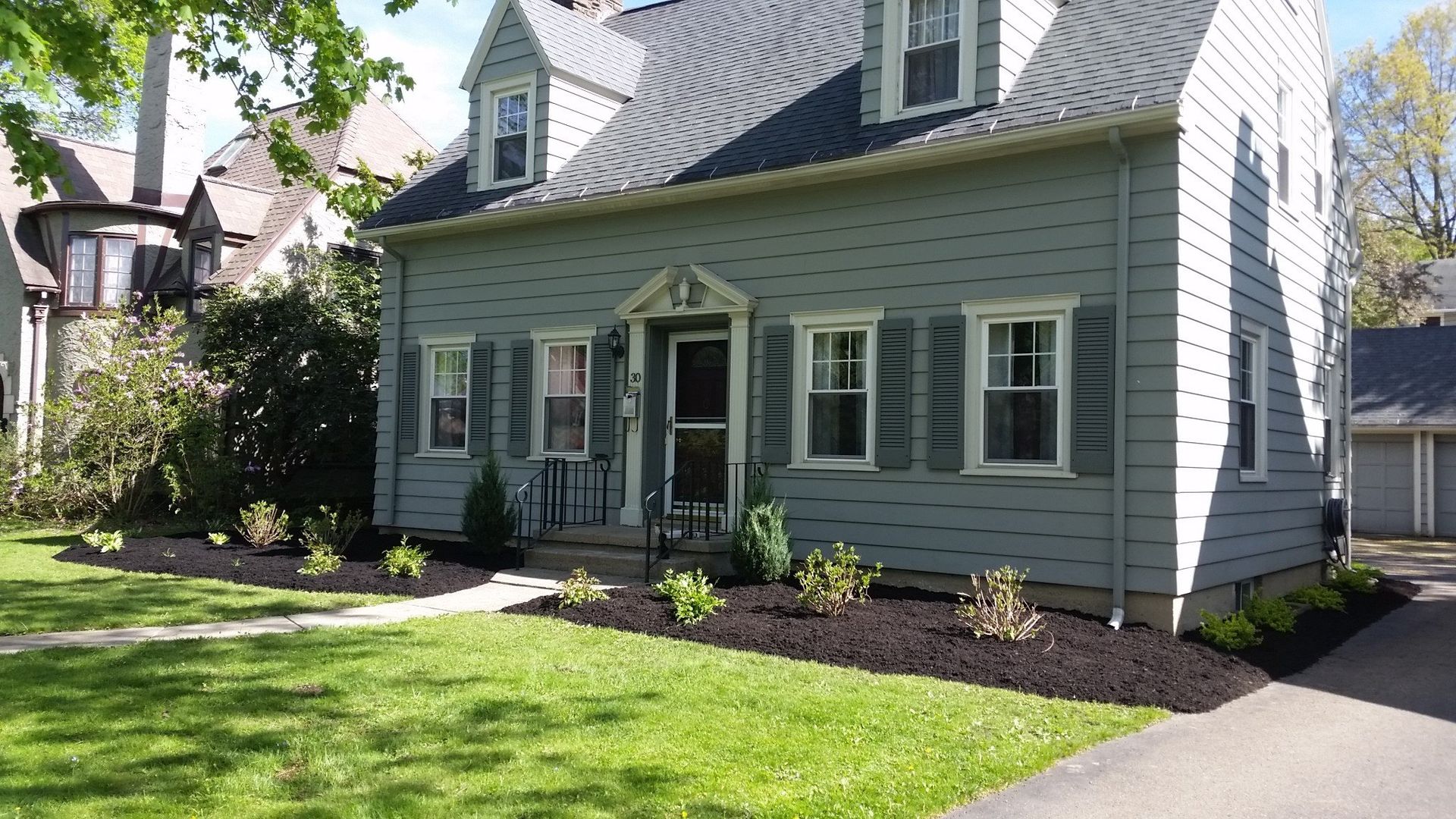 front right of gray house with landscaping