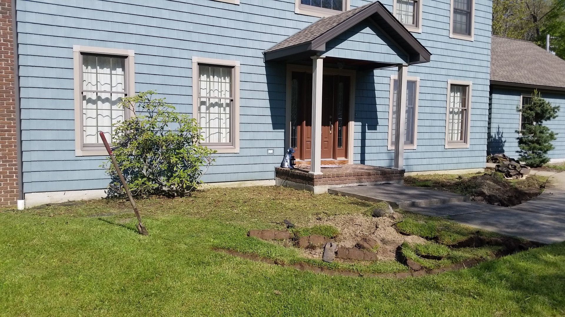 front door of house without landscaping